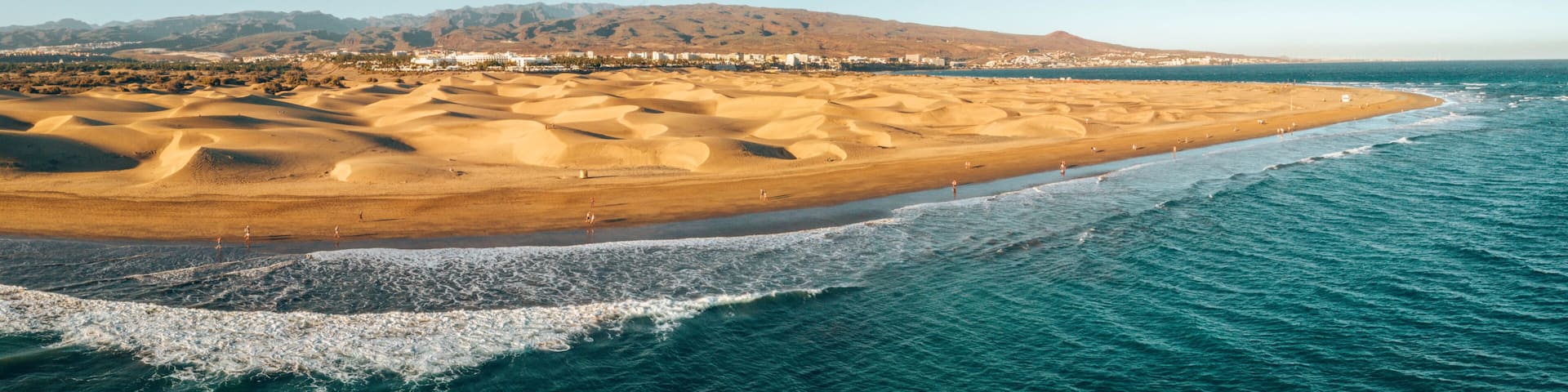 Aerial Maspalomas dunes view on Gran Canaria island near famous RIU hotel.