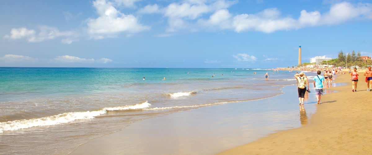 Maspalomas Lighthouse showing a beach and general coastal views