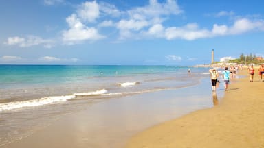 Maspalomas Lighthouse showing a beach and general coastal views