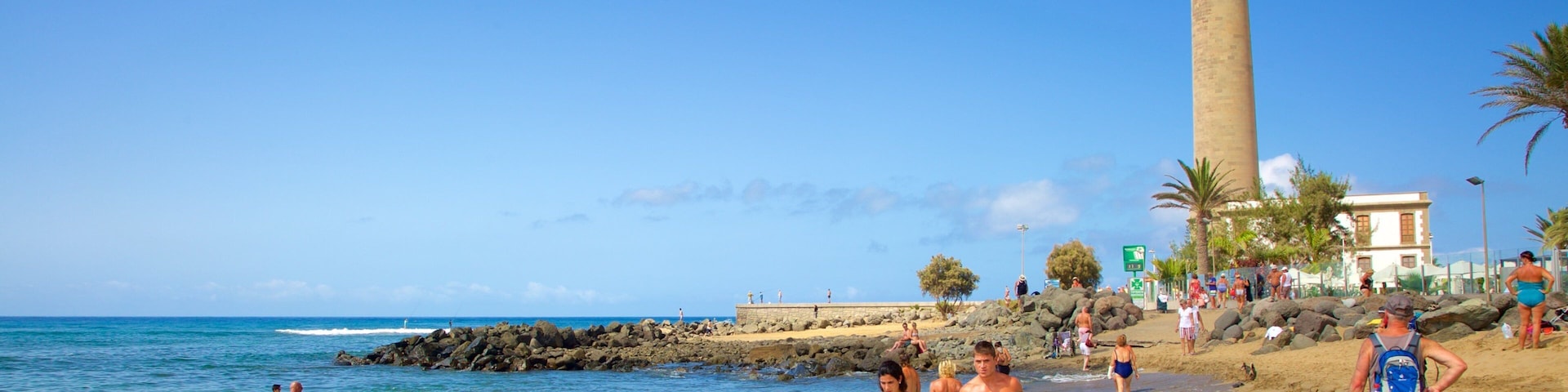 Maspalomas Lighthouse which includes a lighthouse, general coastal views and a sandy beach