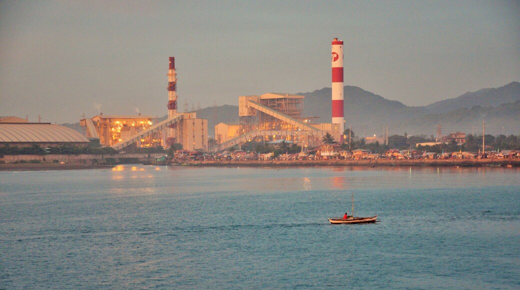 The setting sun was shining on the coal power plant in Toledo City, Cebu as the boat I took from Negros Island gets closer to the port.