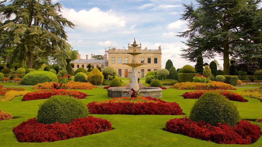 Brodsworth Hall featuring a garden, a fountain and flowers
