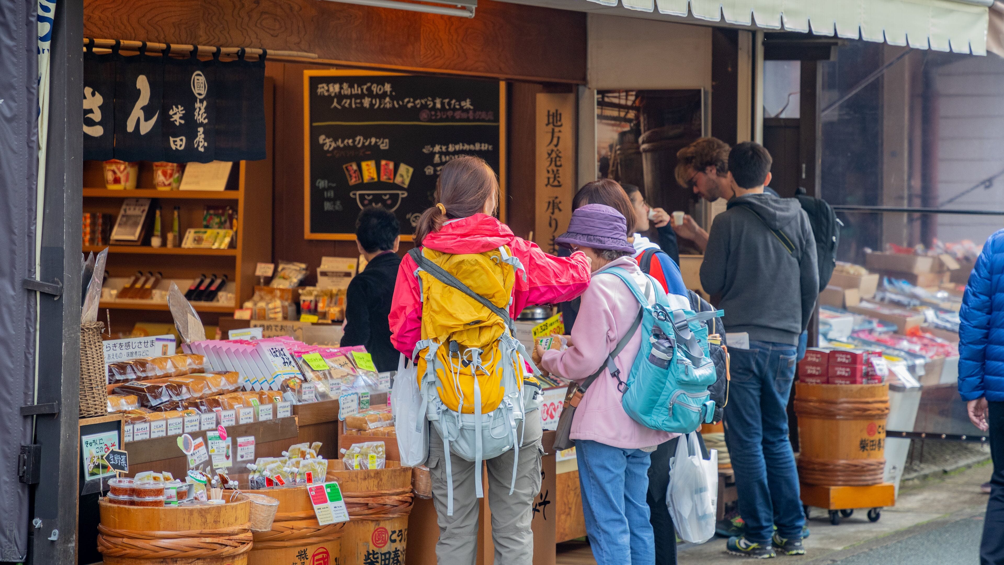 Miyagawa Morning Market showing street scenes as well as a small group of people