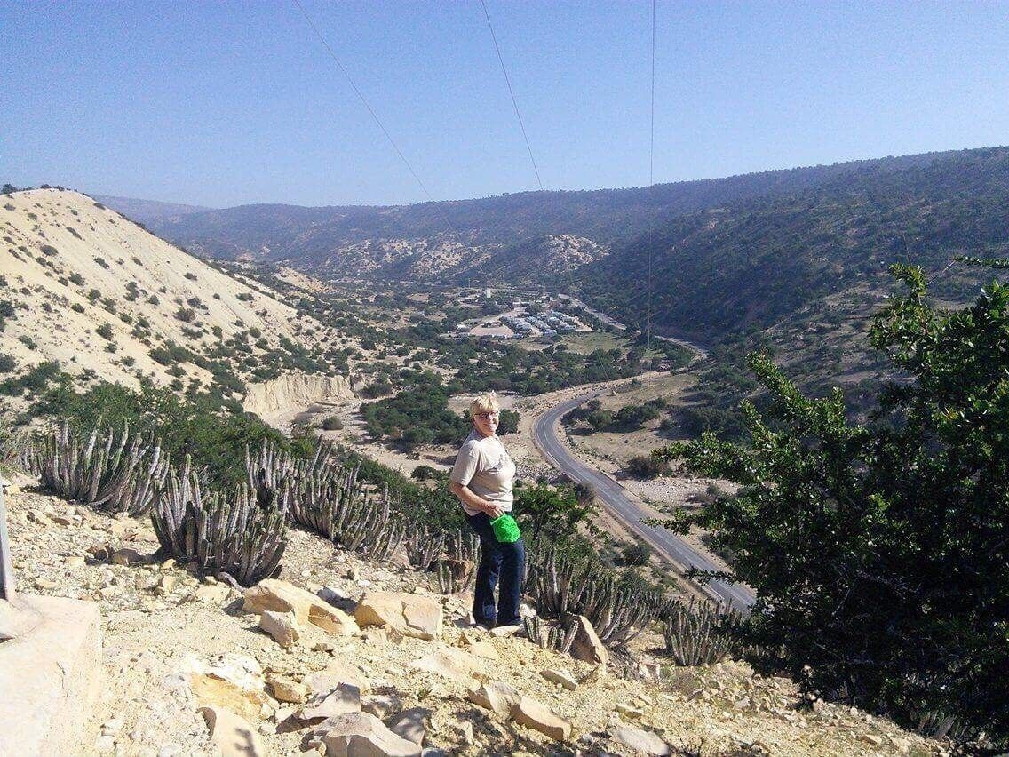 View from the adjacent hills along the valley with the campsite Camping Aourir in the background.