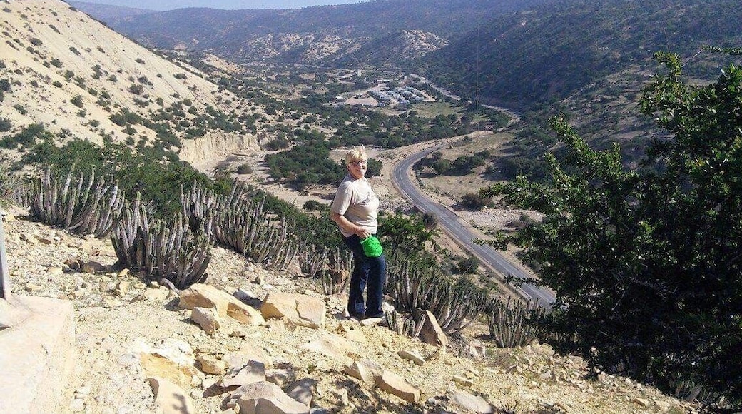 View from the adjacent hills along the valley with the campsite Camping Aourir in the background.