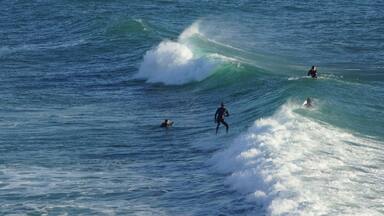 Surfing / Riding waves at Banana Beach Agadir Morocco