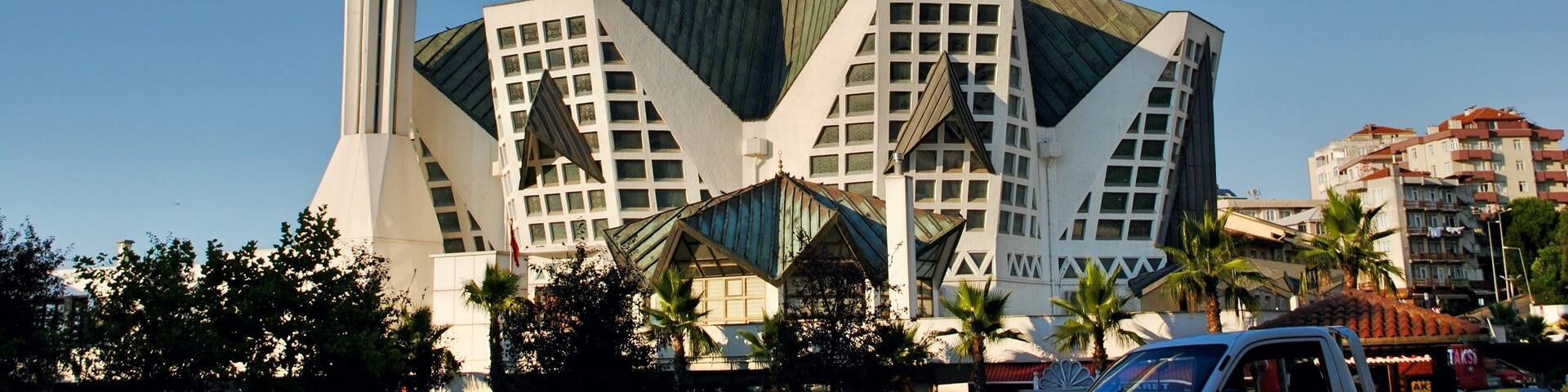 The unusual style exterior of Akcakoca Central Mosque against blue sky. Designed by Ergun Subasi. 20th Century. Akcakoca Turkey