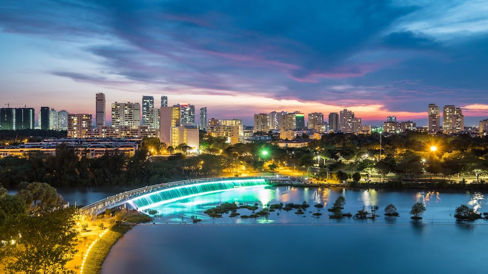Dusk over Ban Nguyet Lake with starlight bridge by the weekend, the central of Phu My Hung, District 7 (new urban/city area Ho Chi Minh City, Vietnam); Shutterstock ID 417419812