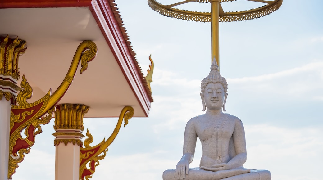 White buddha in Wat Sangkat Rattana Khiri on Khao Sakae Krang mountain in Uthai Thani, Thailand.
