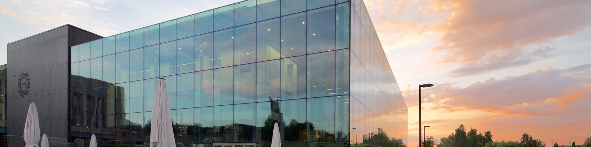 Helsinki featuring a sunset and modern architecture