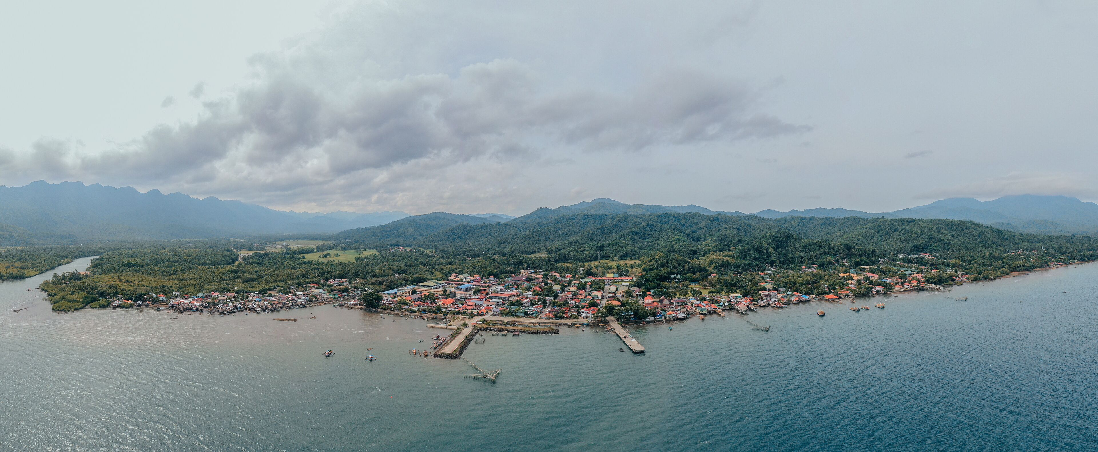 Aerial view of a traditional fishing village in the midst of mountains, Southern Leyte, Philippines