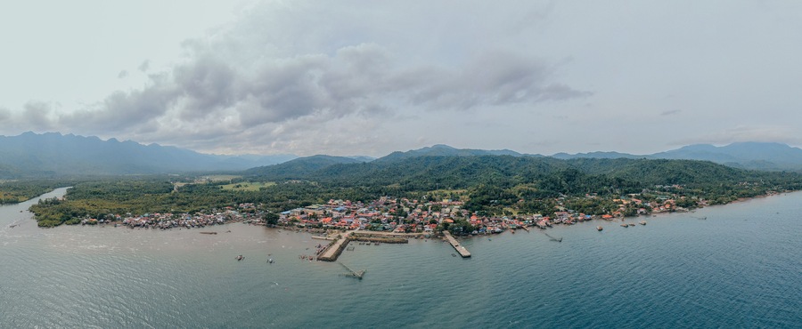 Aerial view of a traditional fishing village in the midst of mountains, Southern Leyte, Philippines