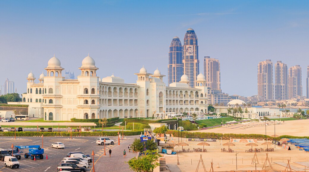 1 December 2025, Doha, Qatar: Katara cultural village traditional architecture with beach and modern city skyline