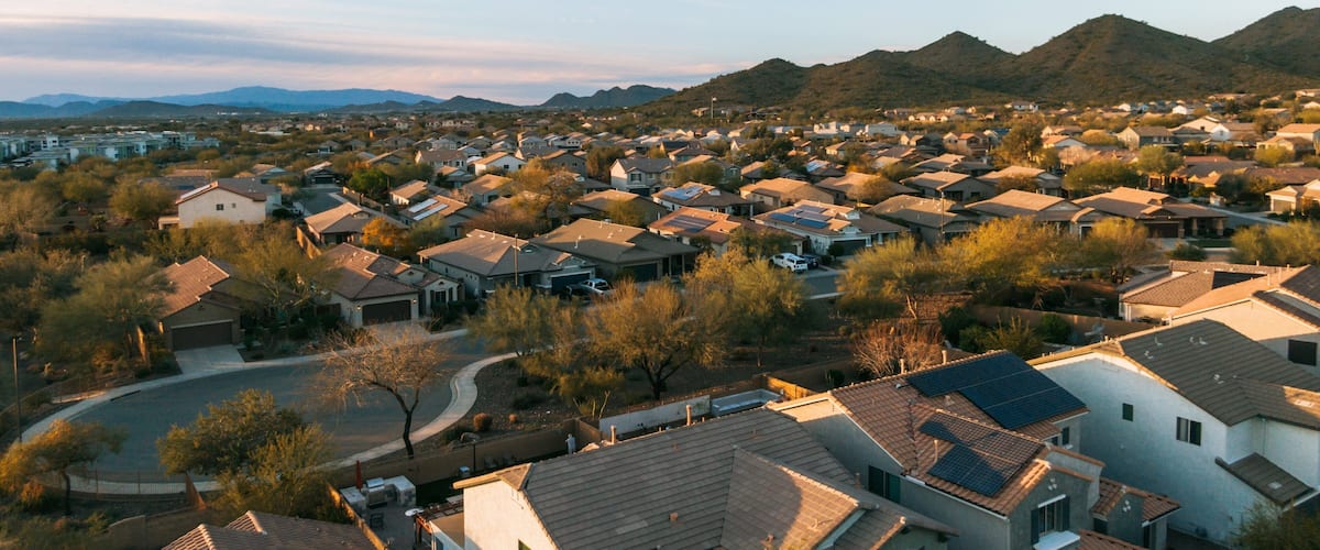 Deer Valley featuring landscape views, a small town or village and a sunset