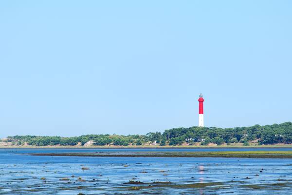 Lighthouse La Coubre at the French Atlantic coast in La Palmyre ; Shutterstock ID 704664040; purchase_order: SP-1332 HA Batch 2 August 2018; Order: ; client: HomeAway; other: To be paid with HA budget
