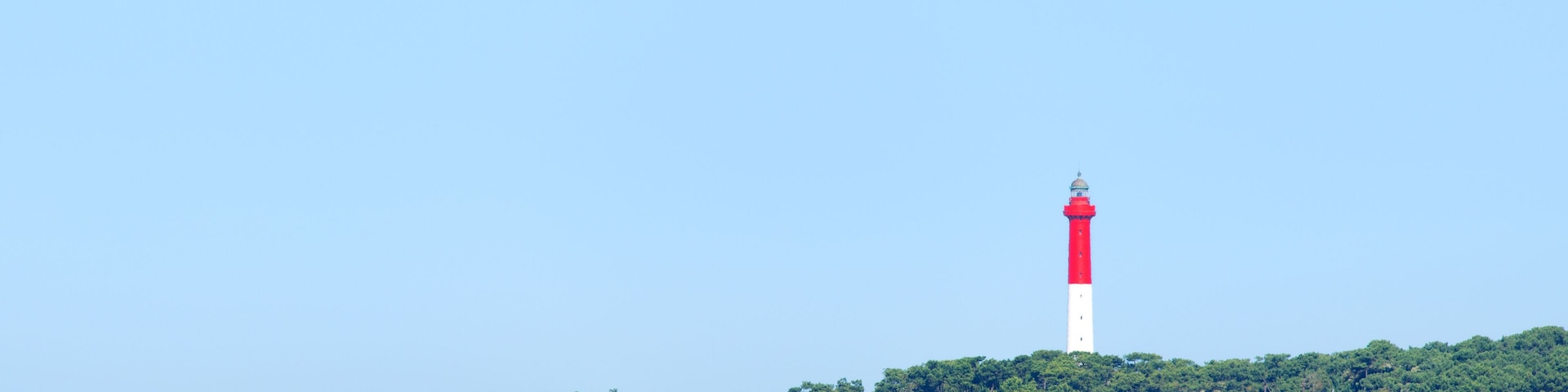 Lighthouse La Coubre at the French Atlantic coast in La Palmyre ; Shutterstock ID 704664040; purchase_order: SP-1332 HA Batch 2 August 2018; Order: ; client: HomeAway; other: To be paid with HA budget