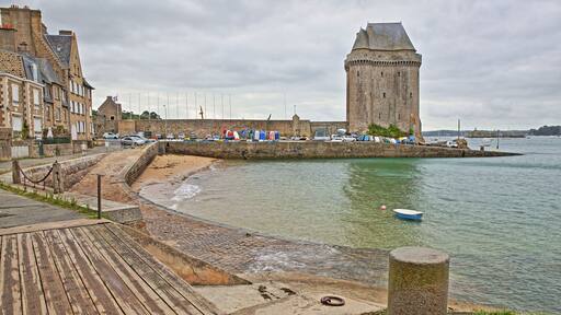 Solidor Tower located in the estuary of the river Rance in Saint Servan with Saint Pere beach in the foreground, Saint Malo, Brittany, France