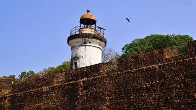 Old colonial lighthouse and old fortress wall of Tellicherry Fort (Thalassery Fort), Thalassery, Kerala, India
