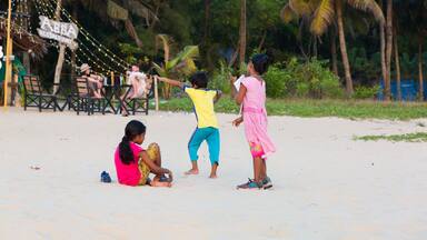 Mararikulam, Kerala - January 5, 2019: Children playing on the beach in Marari Beach in Mararikulam kerala india
