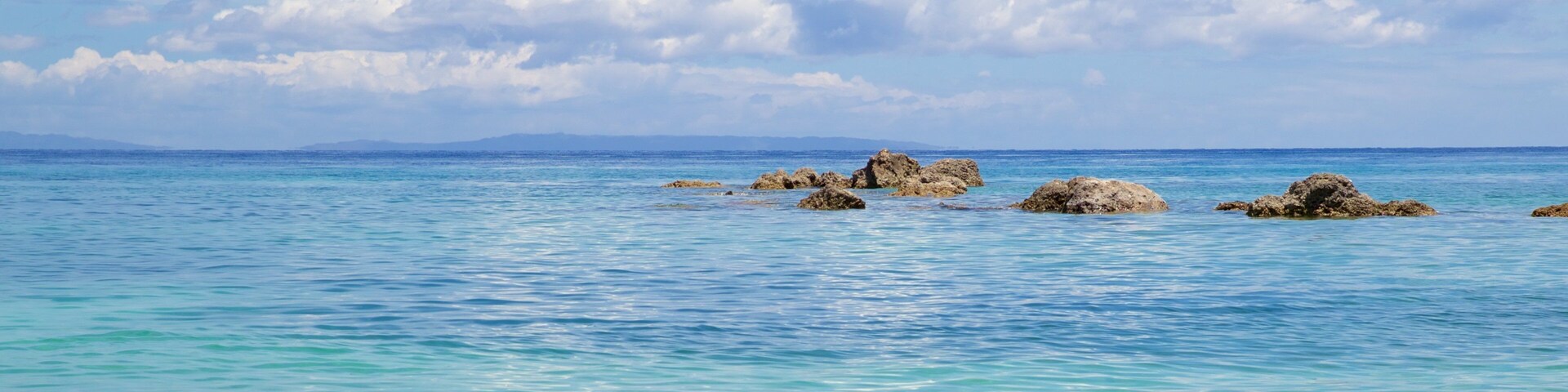 Calumboyan Public Beach showing general coastal views