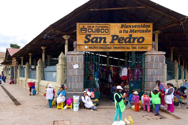 Cusco San Pedro Market which includes markets as well as a small group of people