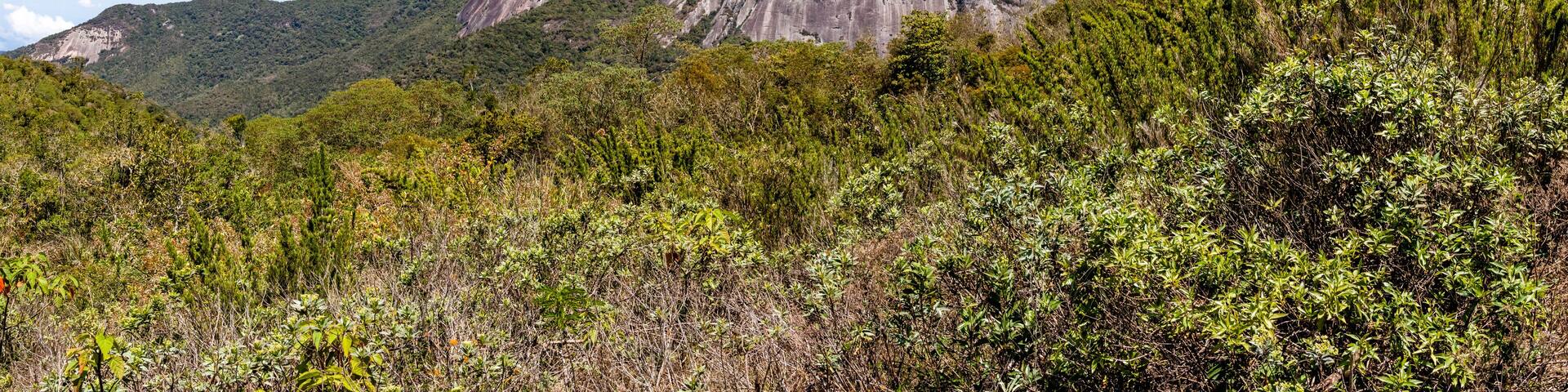 Tres Picos and Capacete rocky mountains, Salinas State Park, with famous climbing routes, sunny day with few clouds, Teresopolis, Rio de Janeiro, Brazil