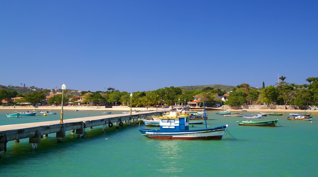 Manguinhos Beach showing a coastal town, a bay or harbour and general coastal views