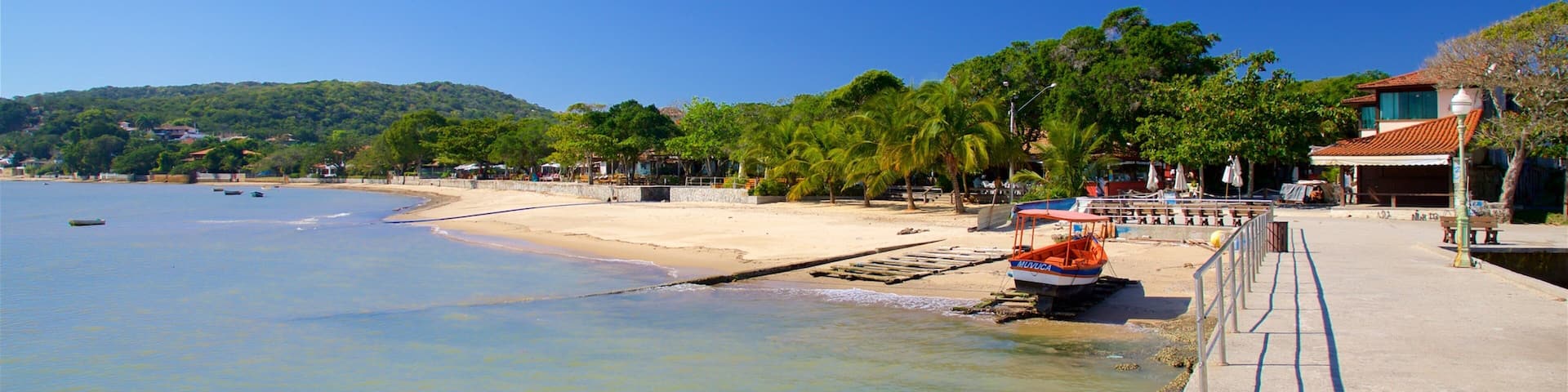 Plage de Manguinhos montrant ville cĂŽtiĂšre, plage et vues littorales