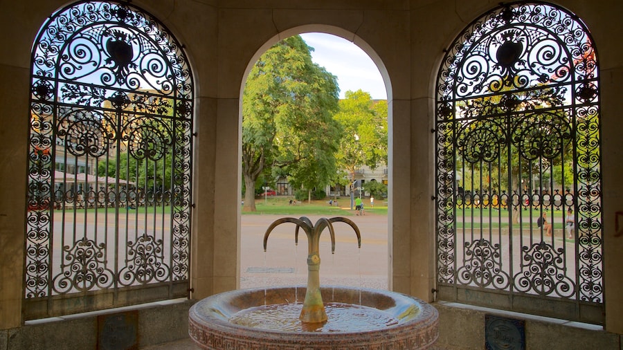 Kochbrunnen featuring a garden, a fountain and interior views