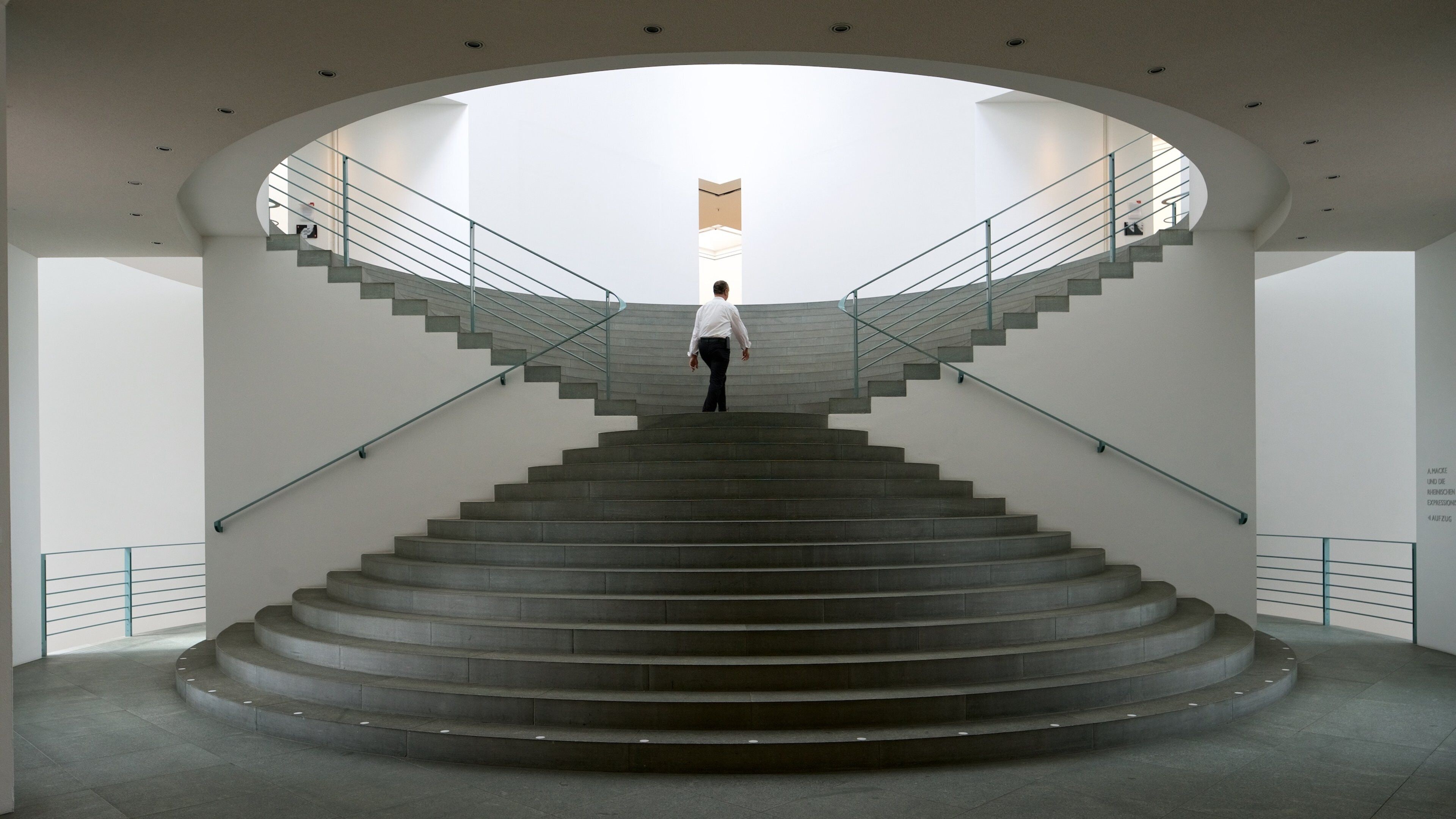 Bonn Arts Museum showing interior views as well as an individual male
