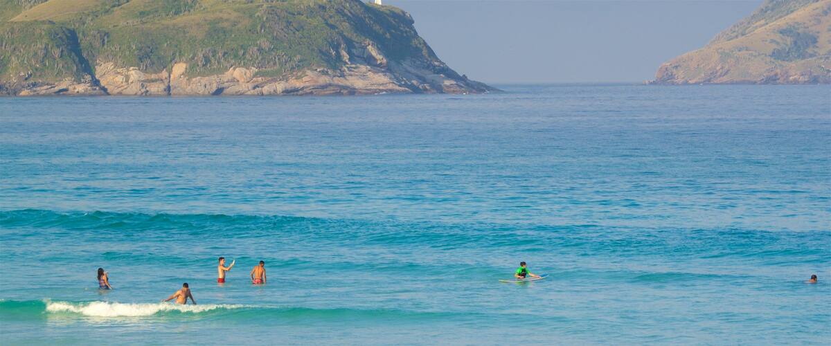 Dunas Beach showing general coastal views, swimming and a sandy beach