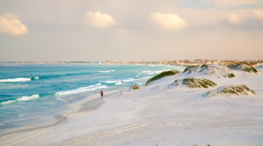 Dunas Beach which includes a beach and general coastal views