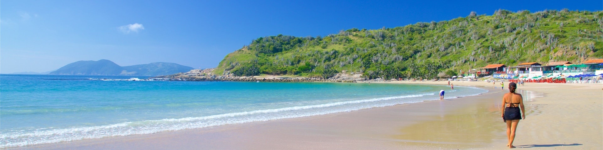 Conchas Beach featuring a sandy beach, general coastal views and a coastal town