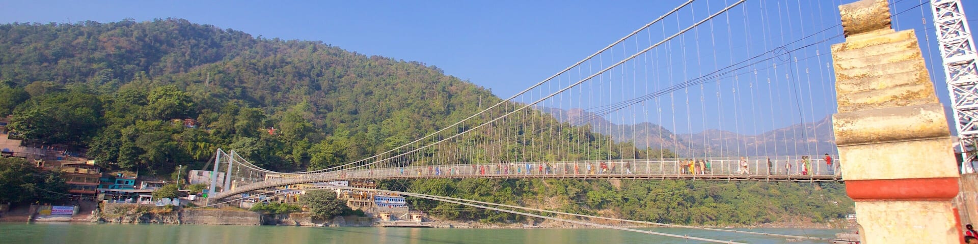 Ram Jhula showing a small town or village, a bridge and a river or creek