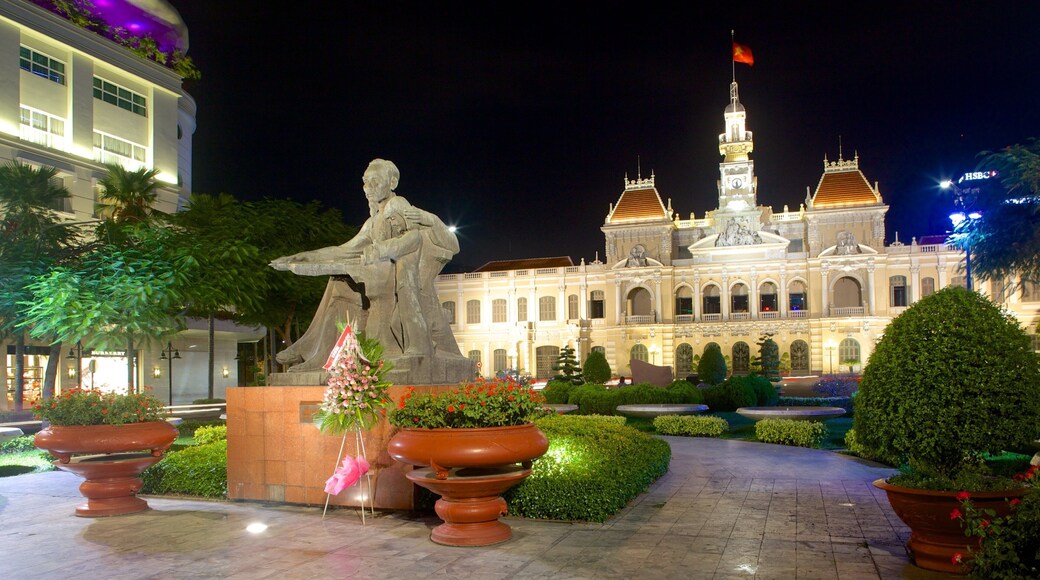 Dong Khoi Street which includes a square or plaza, a statue or sculpture and night scenes