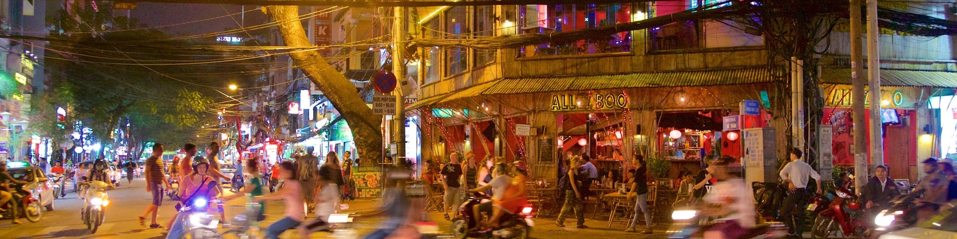 Pham Ngu Lao Street which includes night scenes, shopping and street scenes