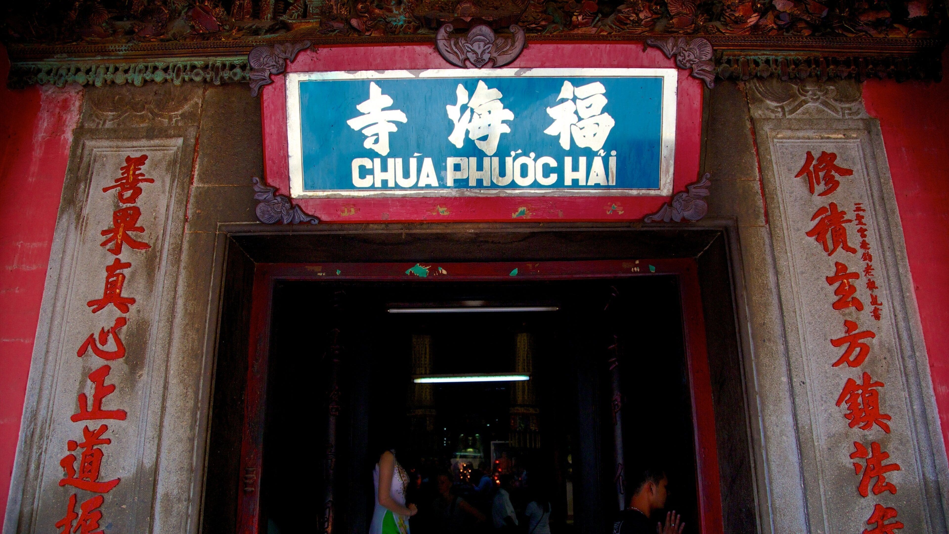 A traditional Chinese building entrance with a sign reading "CHUA PHUOC HAI".