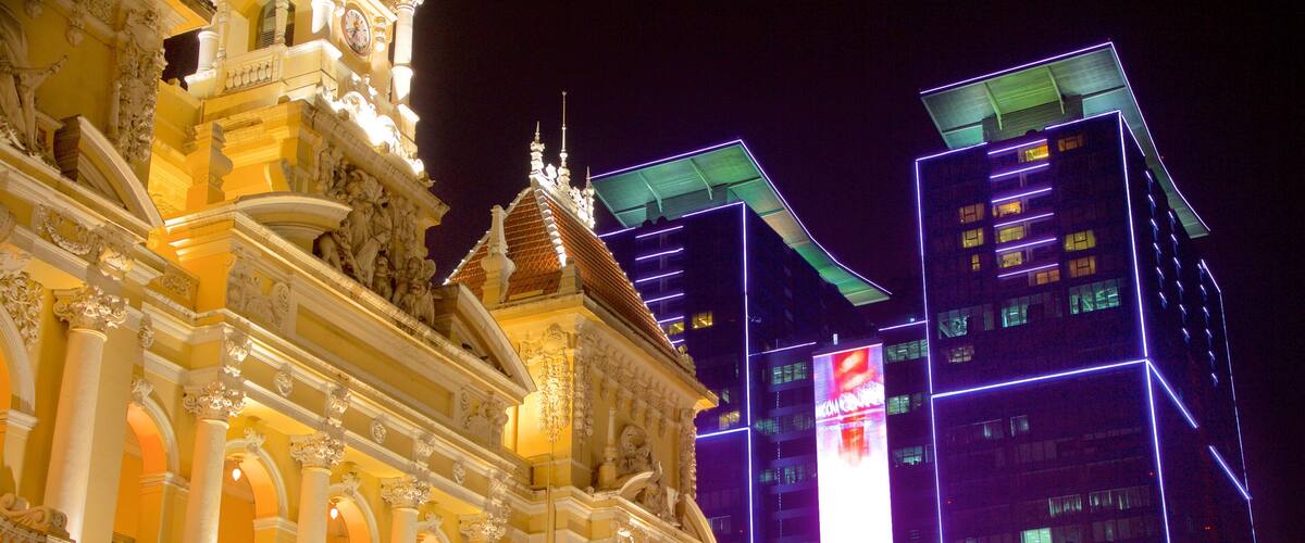 Ho Chi Minh City Hall Square showing night scenes, modern architecture and heritage architecture