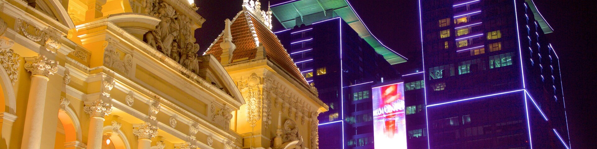 Ho Chi Minh City Hall Square showing night scenes, modern architecture and heritage architecture