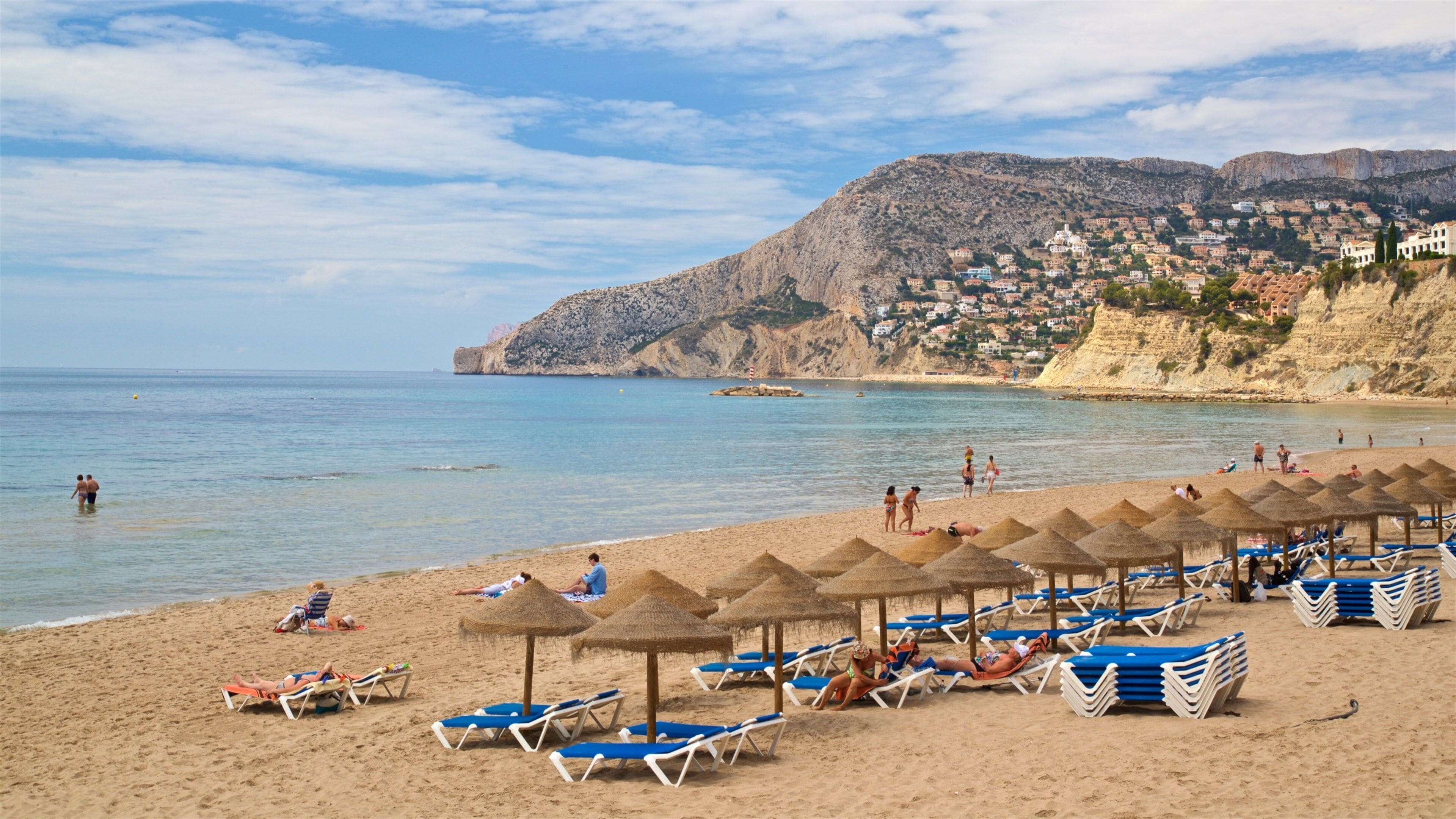 Arenal-Bol Beach which includes general coastal views and a beach