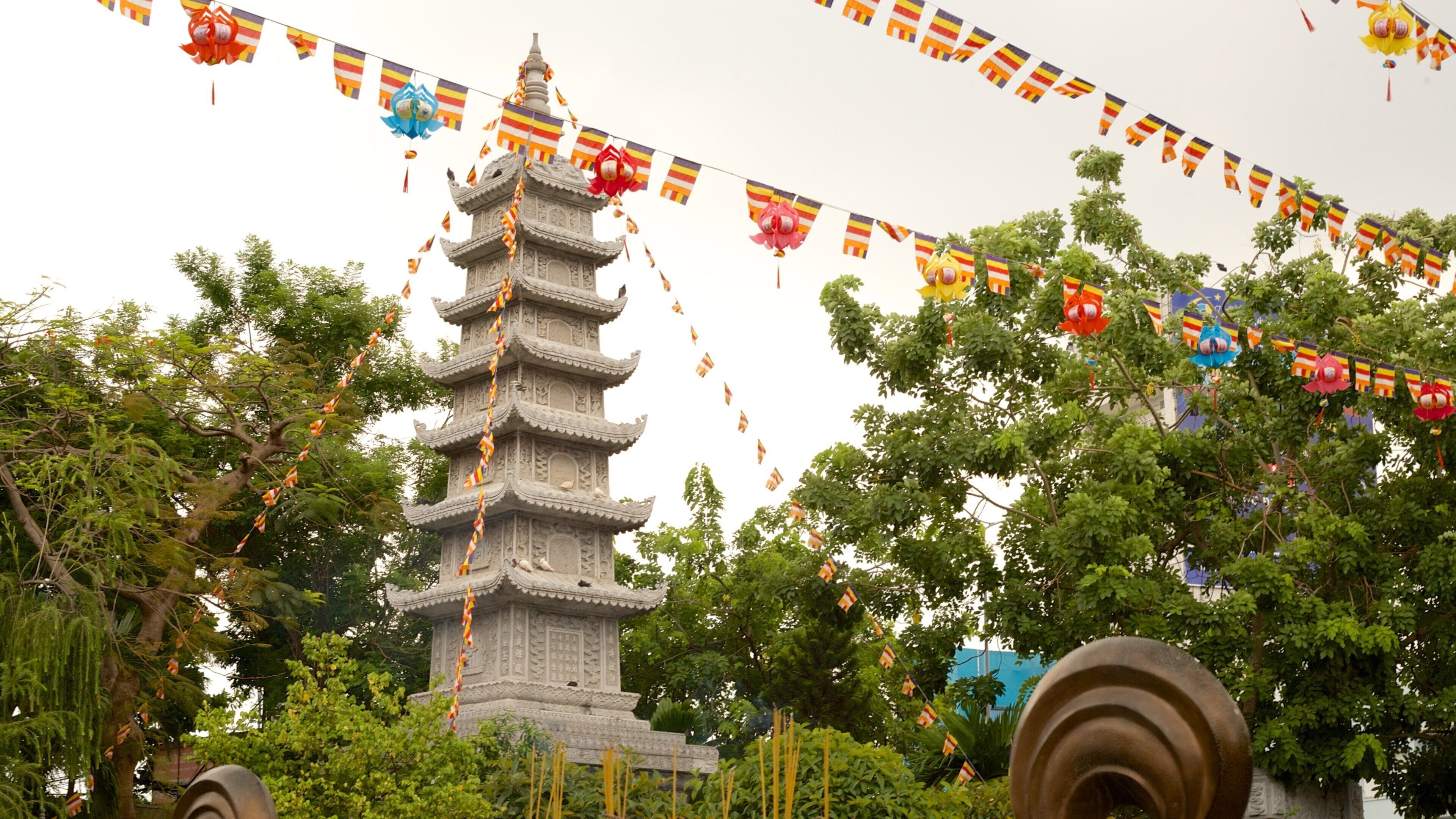 Vinh Nghiem Pagoda which includes a temple or place of worship and religious elements
