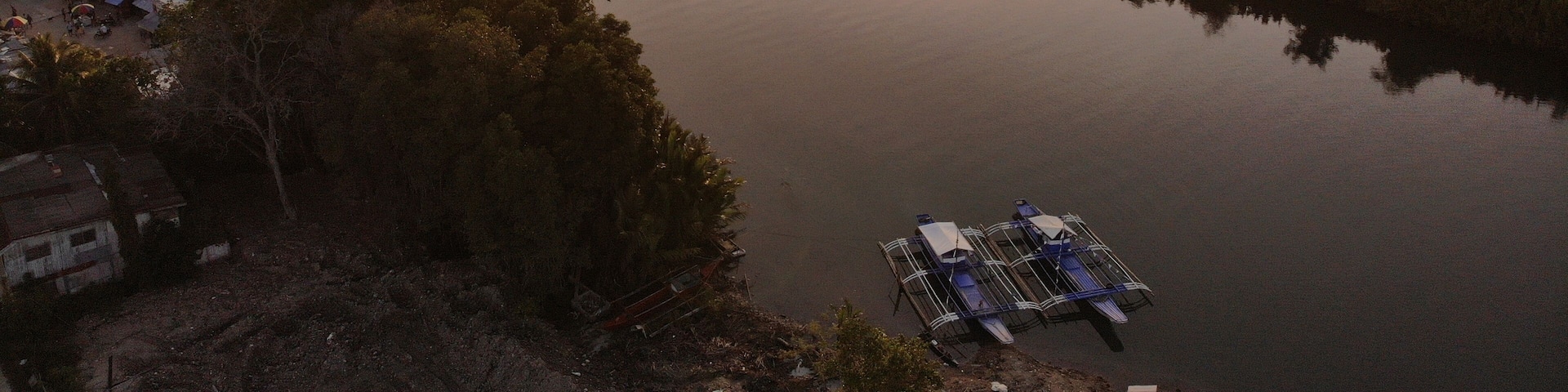 Drone shot during sunset near the restaurant; this is where Loboc river flows into the sea