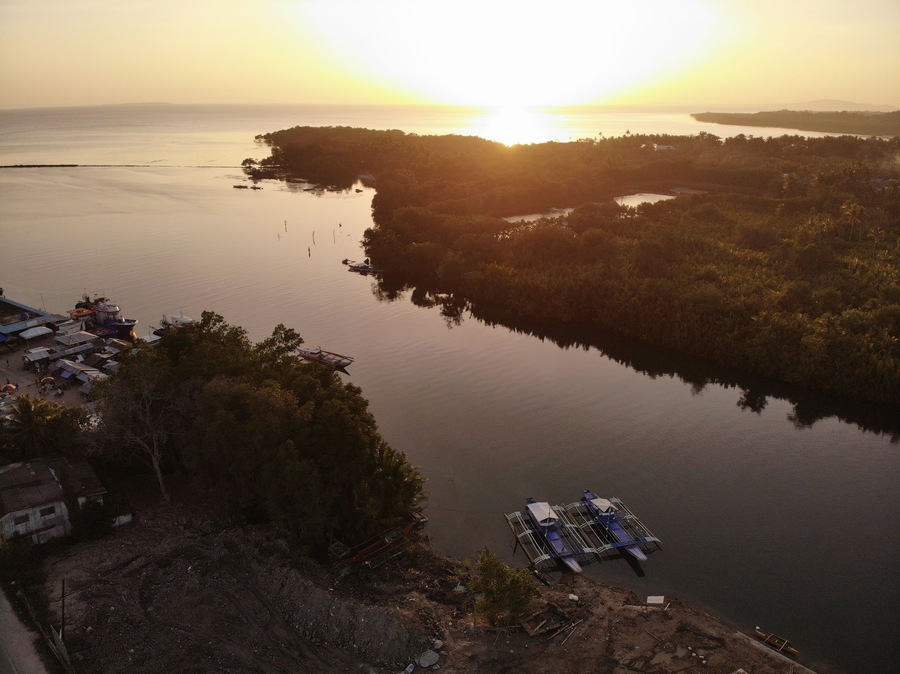 Drone shot during sunset near the restaurant; this is where Loboc river flows into the sea
