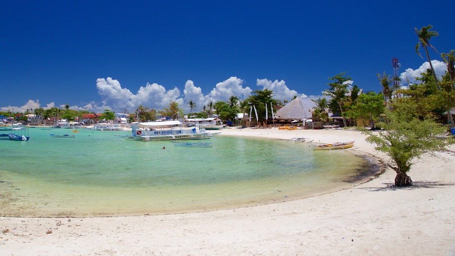Logon which includes a beach and general coastal views