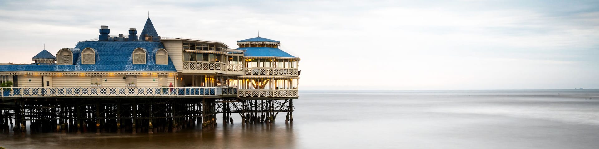 Playa Waikiki in Lima, Peru, and pier restaurant - long exposure