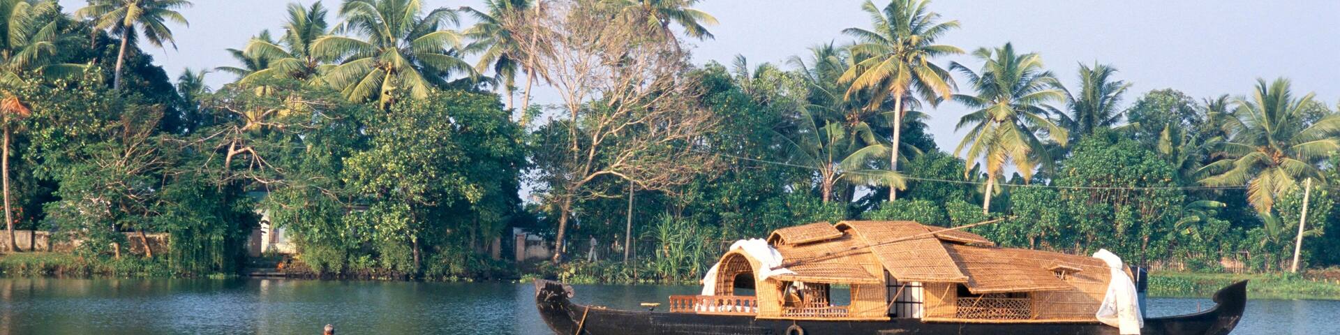 Tourists' rice boat on the backwaters near Kayamkulam, Kerala