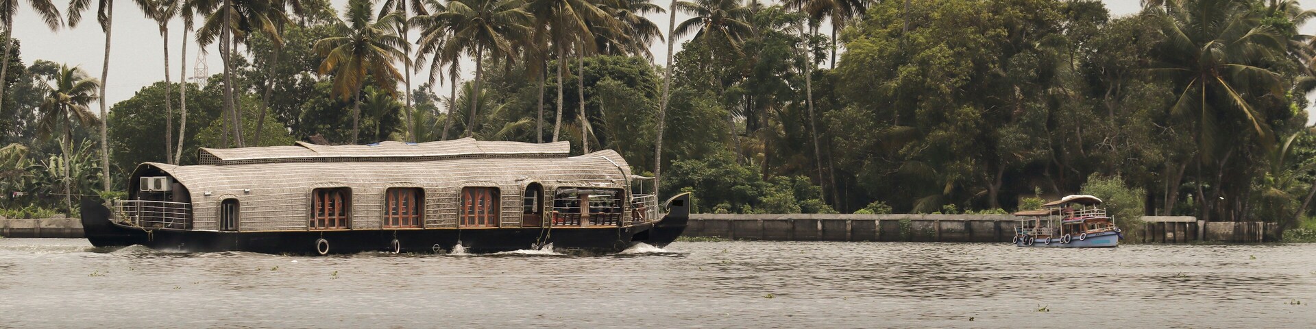 The House boat traditionally built with wood and coir is a major attraction for the travellers visiting Keral backwaters for Eco tourism in Kochi, India.