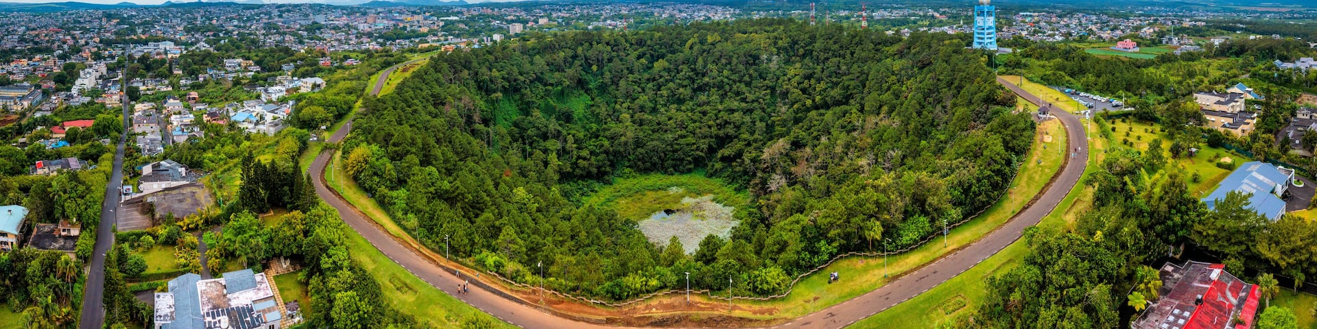 Aerial top view perspective of Trou Aux Cerf Volcano Curepipe in the tropical island jungle of Mauritius. Aerial view of Trou aux cerfs dormant volcano located at Curepipre, Mauritius