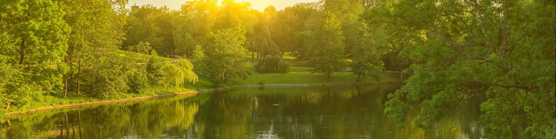 Lake sunny landscape in Frogner park, Oslo, Norway