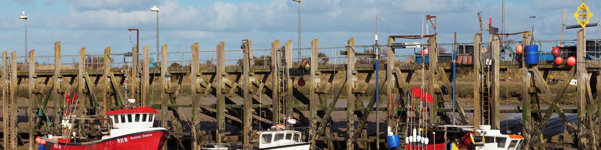 Rye Harbour
With its olde world charm, Rye is one of the historic cinque ports of South East England.
Wander through the lanes browsing the shops and taking in the architecture, or stroll along the harbour with its huge selection of fishing boats.